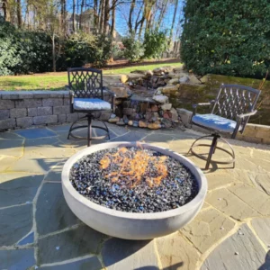 Fire Pit in a patio with metal chairs