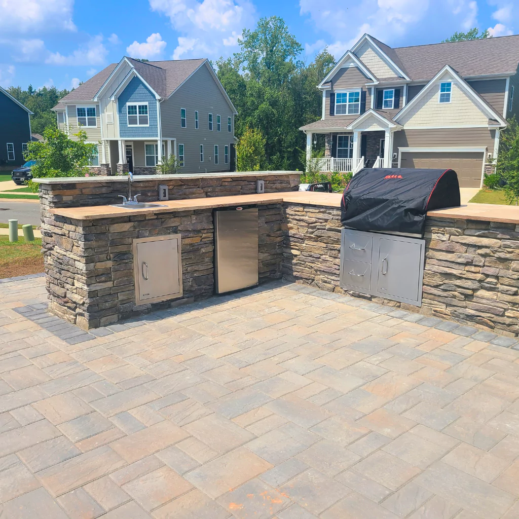An outdoor kitchen set in stone.
