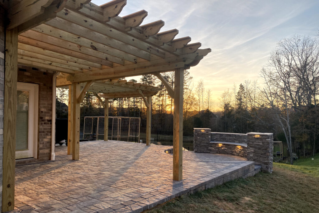 A wood pergola with an afternoon sunset
