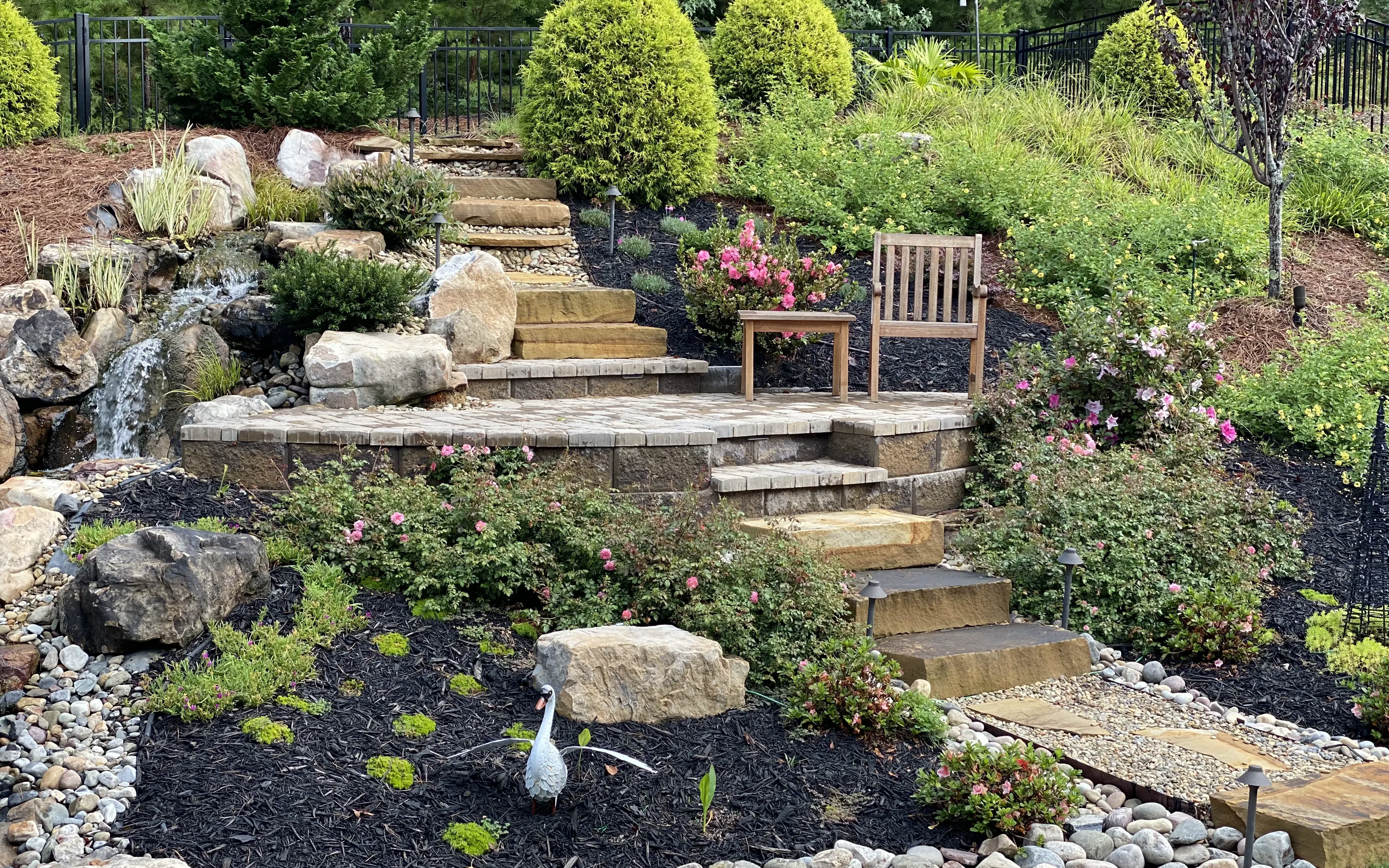 Functional outdoor space with retaining stone walls.