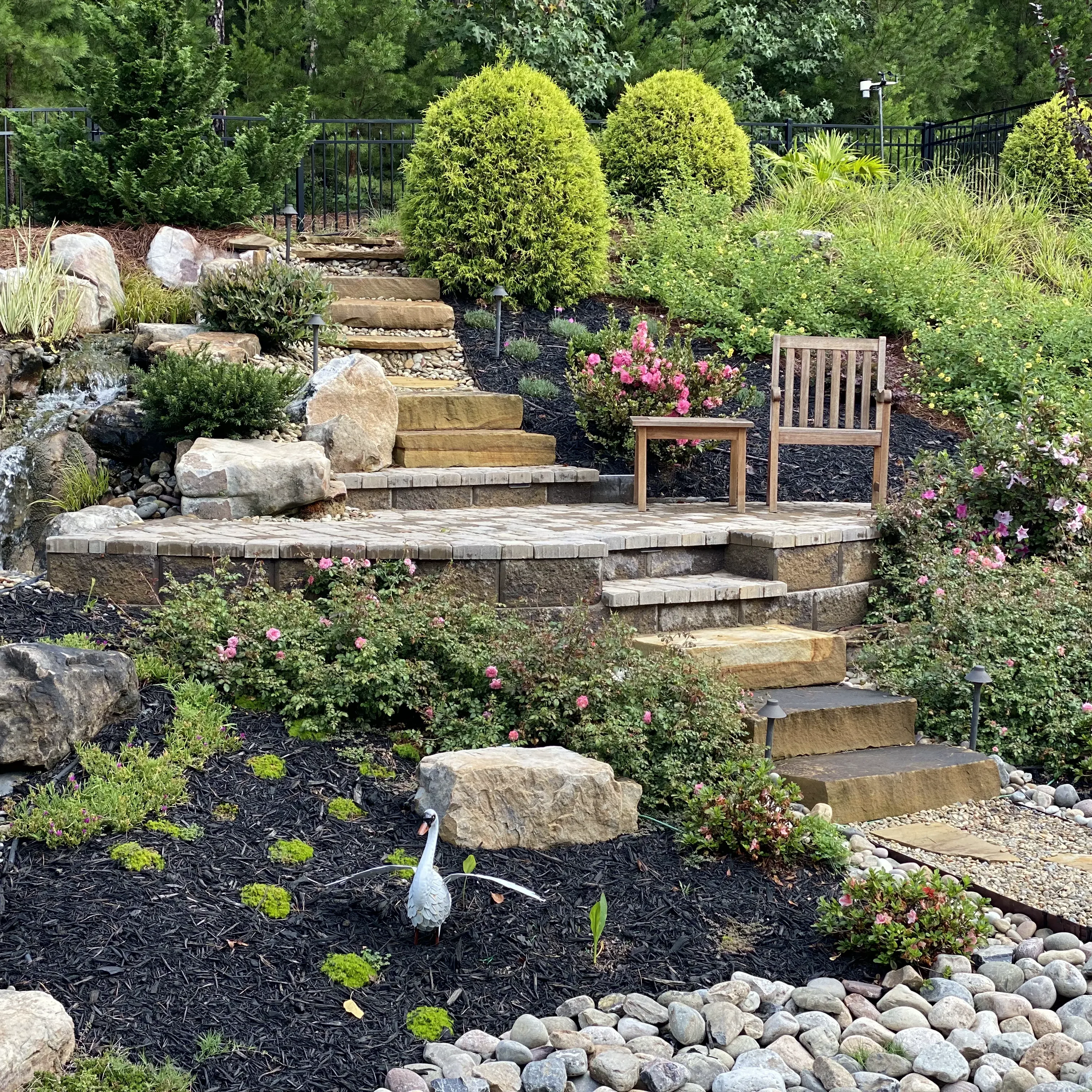 Functional outdoor space with retaining stone walls.