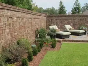 SunSouth Carolinas builds substantial brick garden walls, providing beauty and privacy for paver patios and outdoor living spaces.