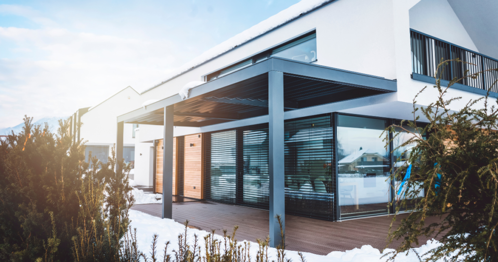 Modern house with snowy patio view